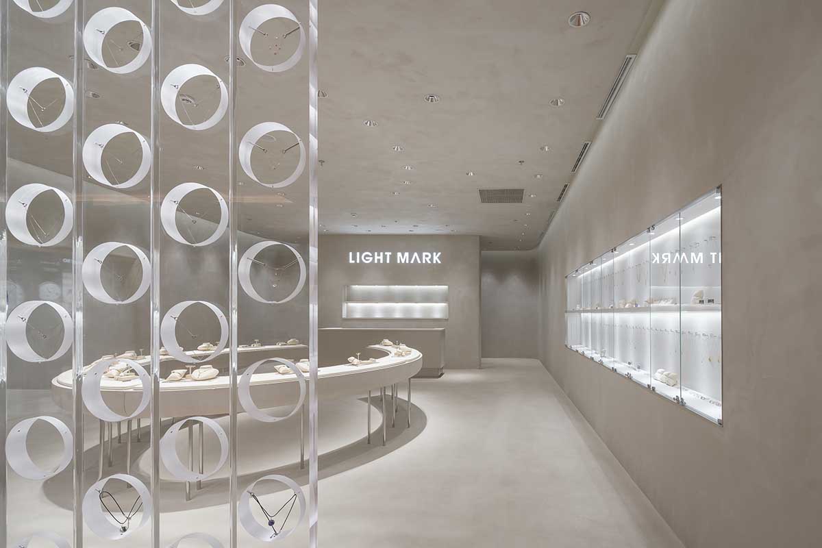 kooo architects adds transparent floating halos as a screen to jewelry store in Suzhou 