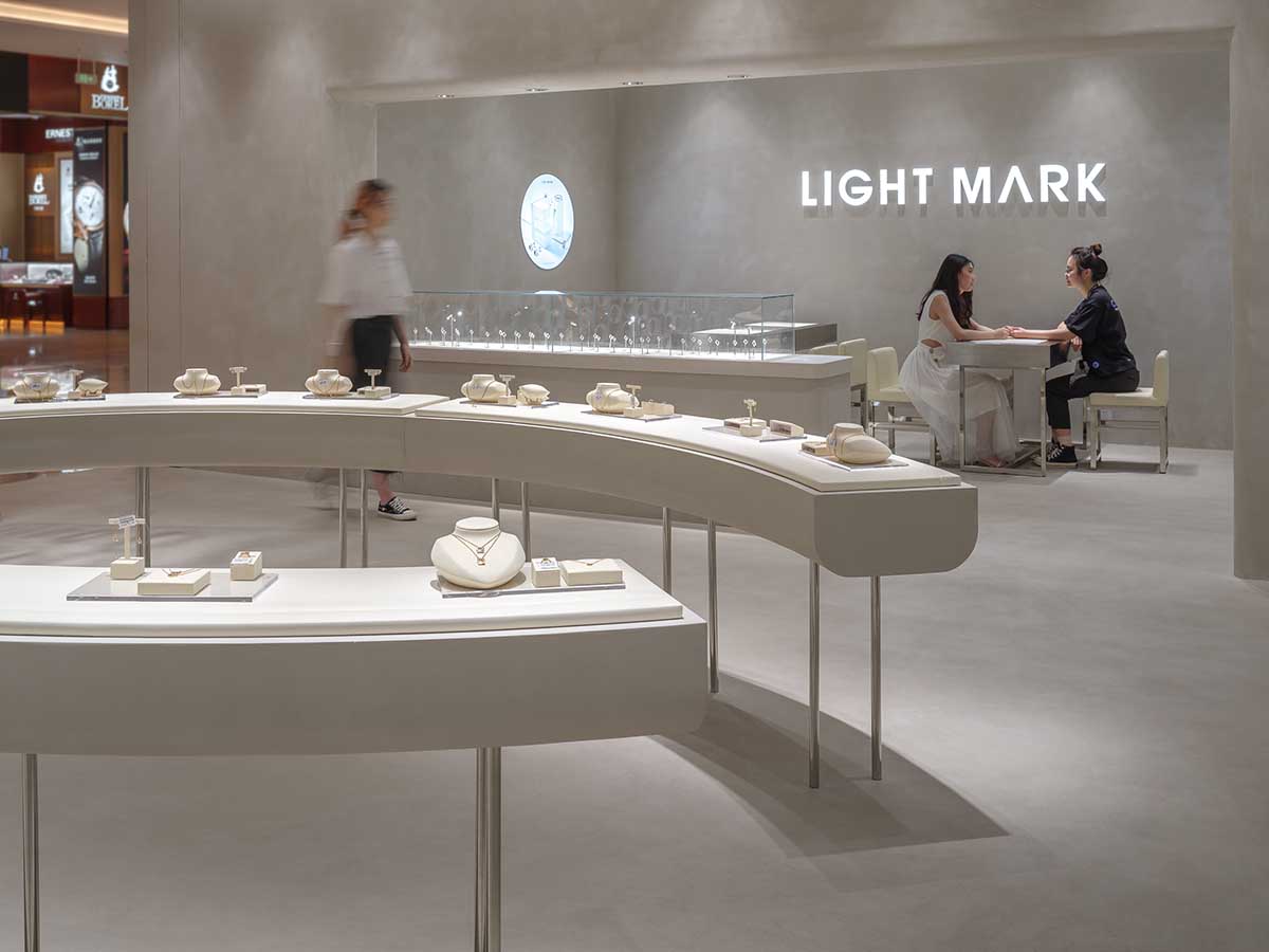 kooo architects adds transparent floating halos as a screen to jewelry store in Suzhou 