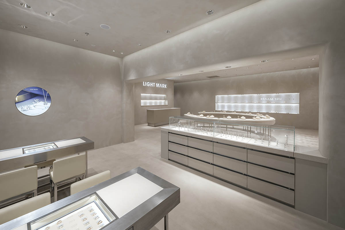kooo architects add transparent floating halos as a screen at jewelry store in suzhou 