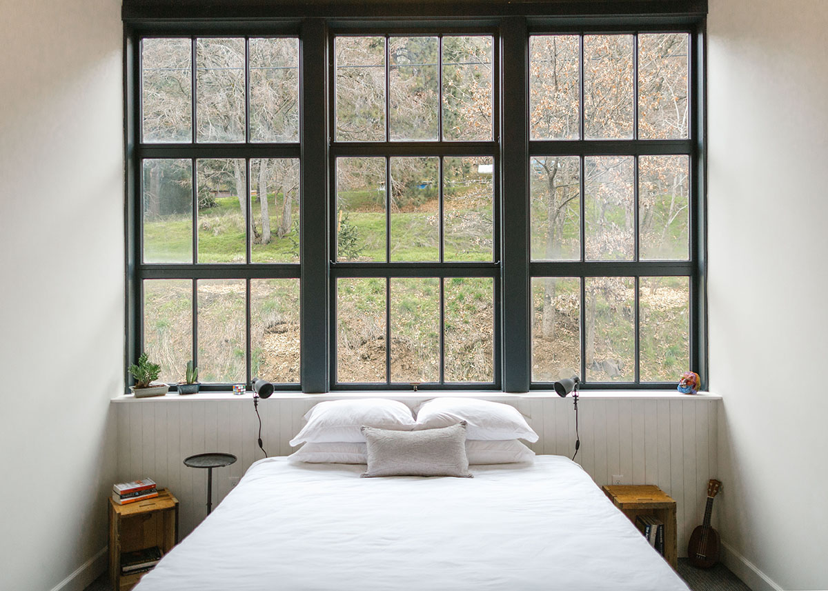 Waechter Architecture converts old school into a rustic hotel in Bingen by keeping its original feel