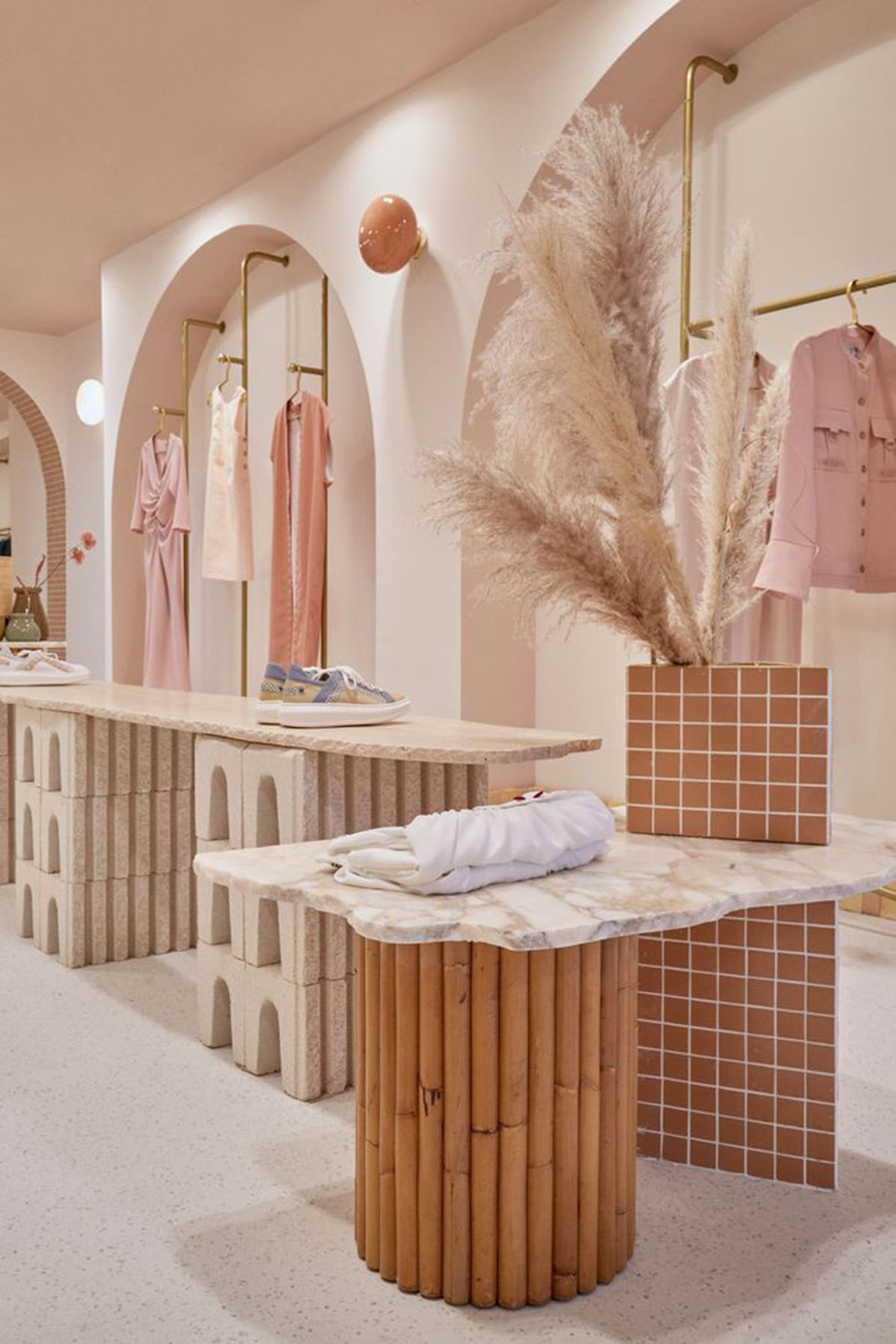 Patricia Bustos Studio creates light pink interiors with arched details for  concept store in Madrid