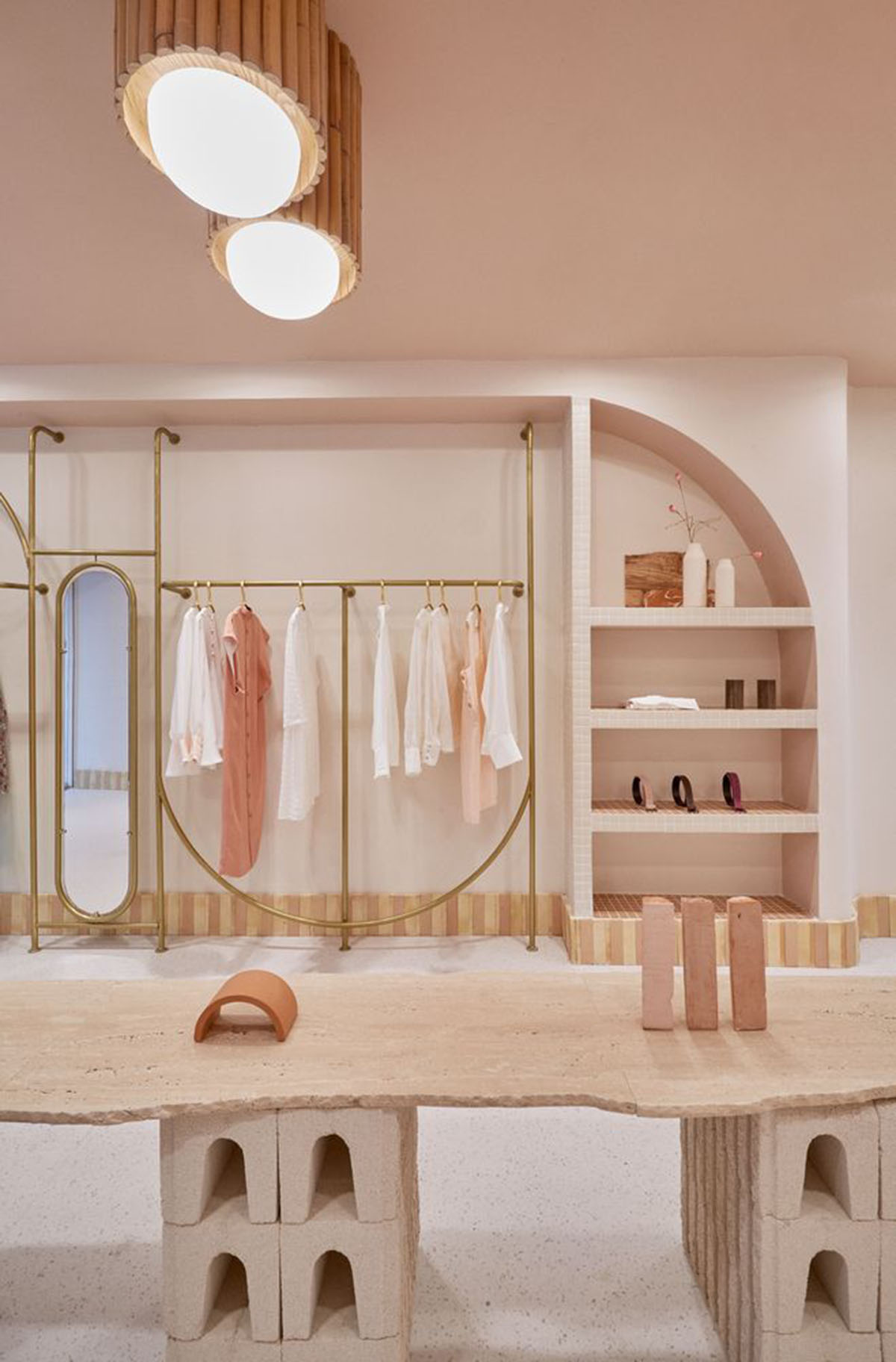 Patricia Bustos Studio creates light pink interiors with arched details for  concept store in Madrid