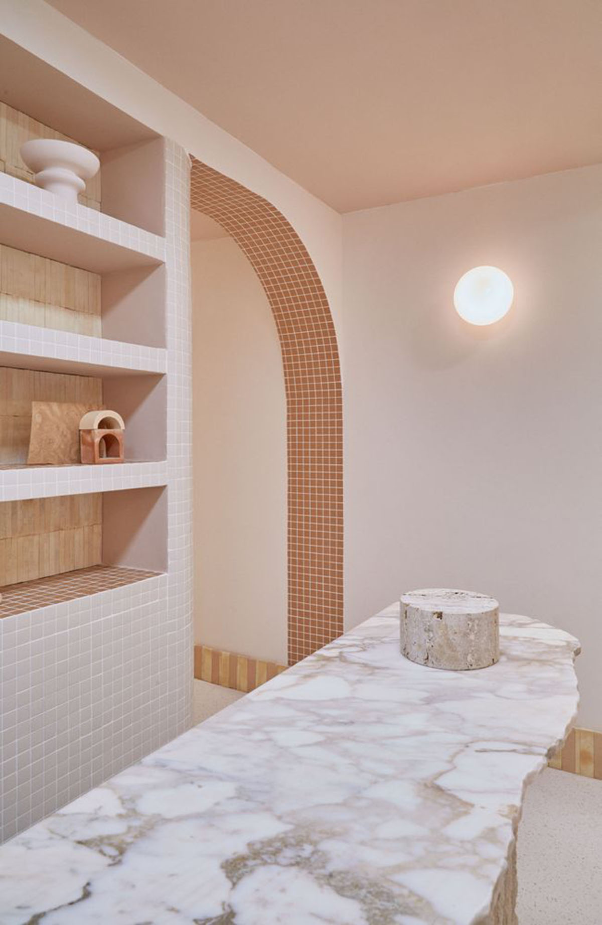 Patricia Bustos Studio creates light pink interiors with arched details for  concept store in Madrid