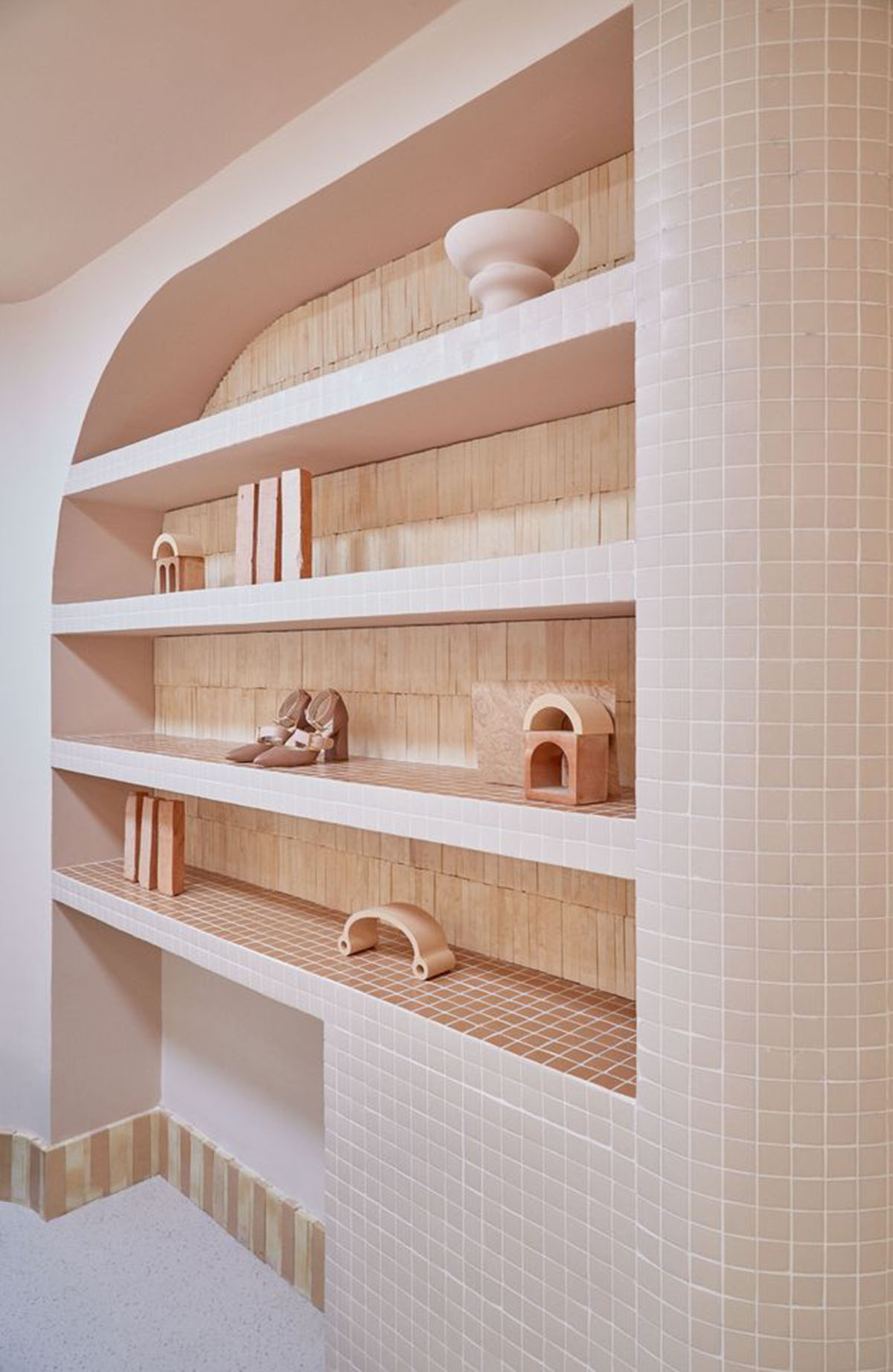 Patricia Bustos Studio creates light pink interiors with arched details for  concept store in Madrid