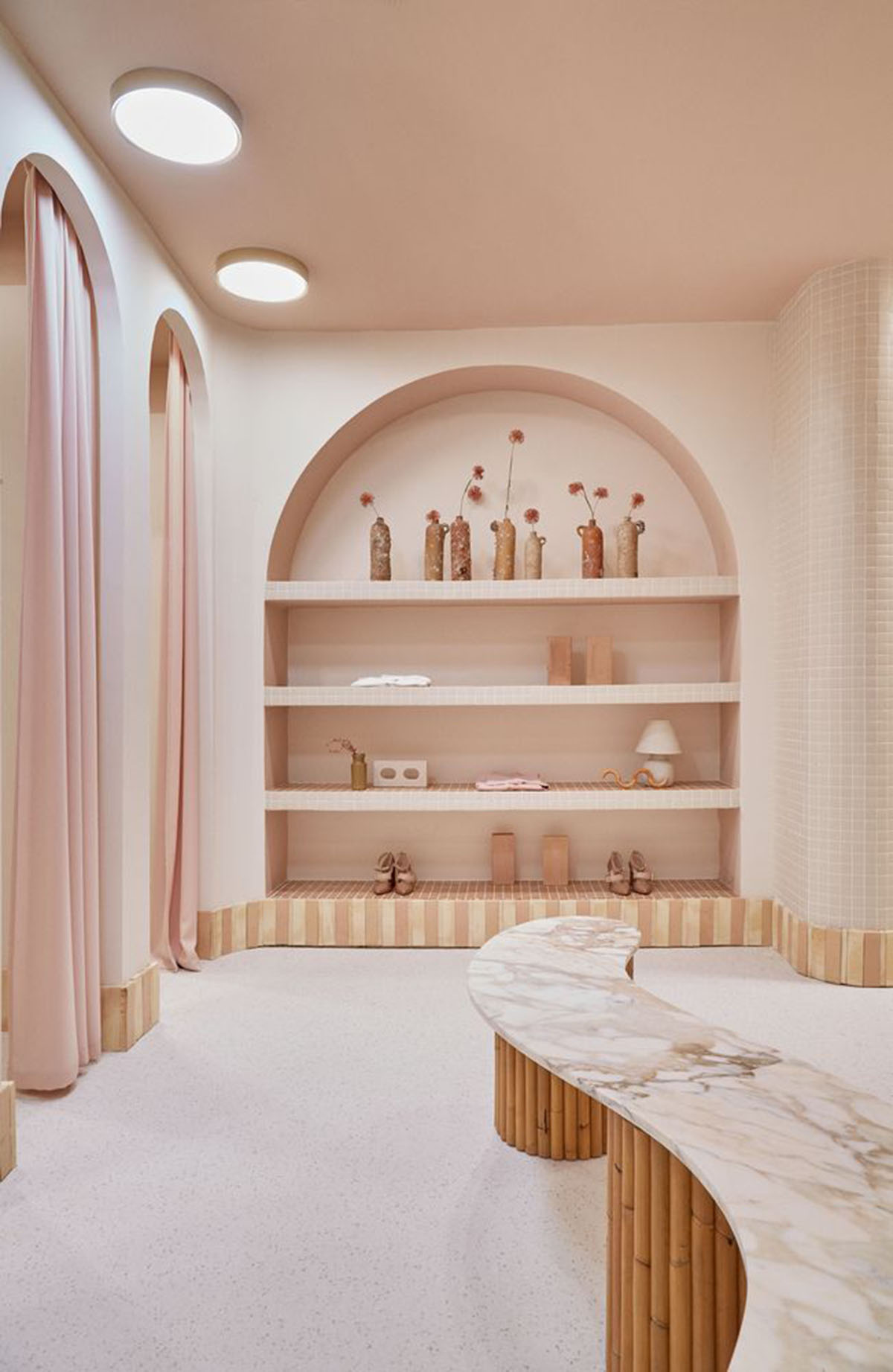 Patricia Bustos Studio creates light pink interiors with arched details for  concept store in Madrid