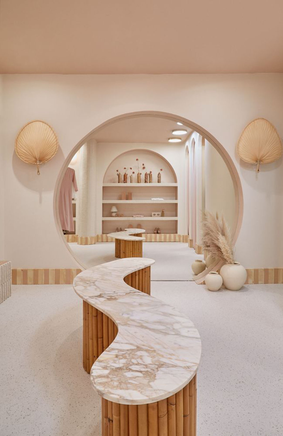 Patricia Bustos Studio creates light pink interiors with arched details for  concept store in Madrid