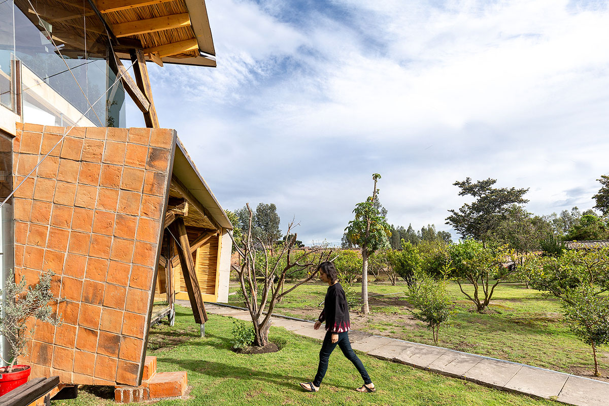 Daniel Moreno Flores creates welcoming screen with hanging tiles to mark this house in Ecuador