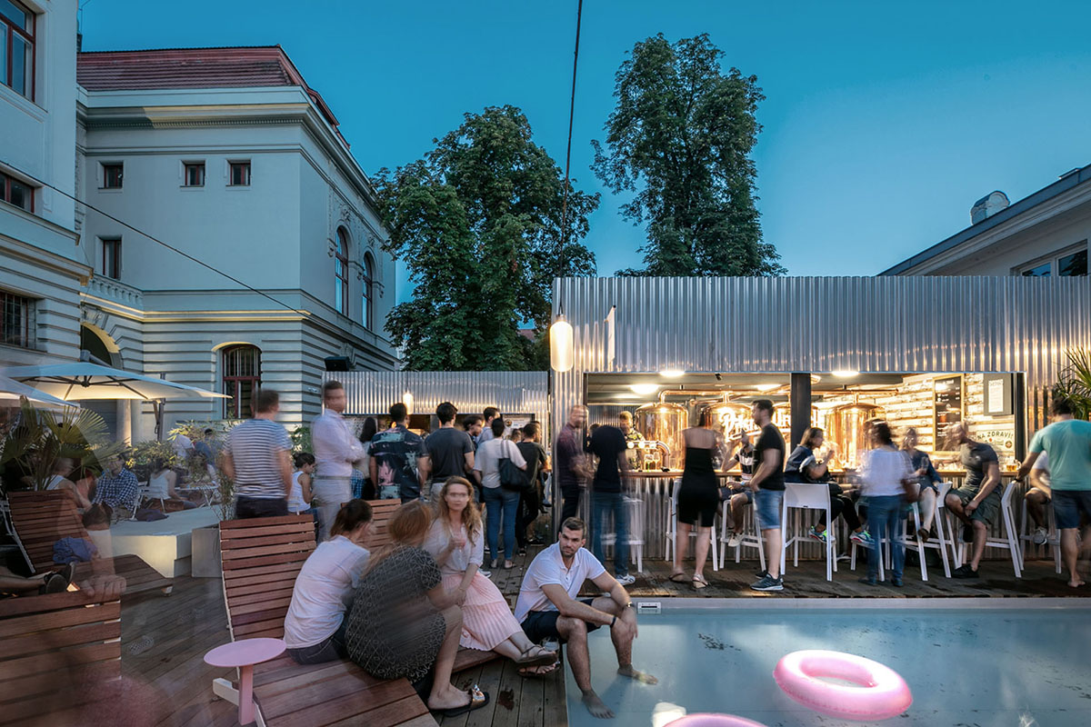 Manifesto food market expands with CHYBIK + KRISTOF-designed metal cabins in Smichov district