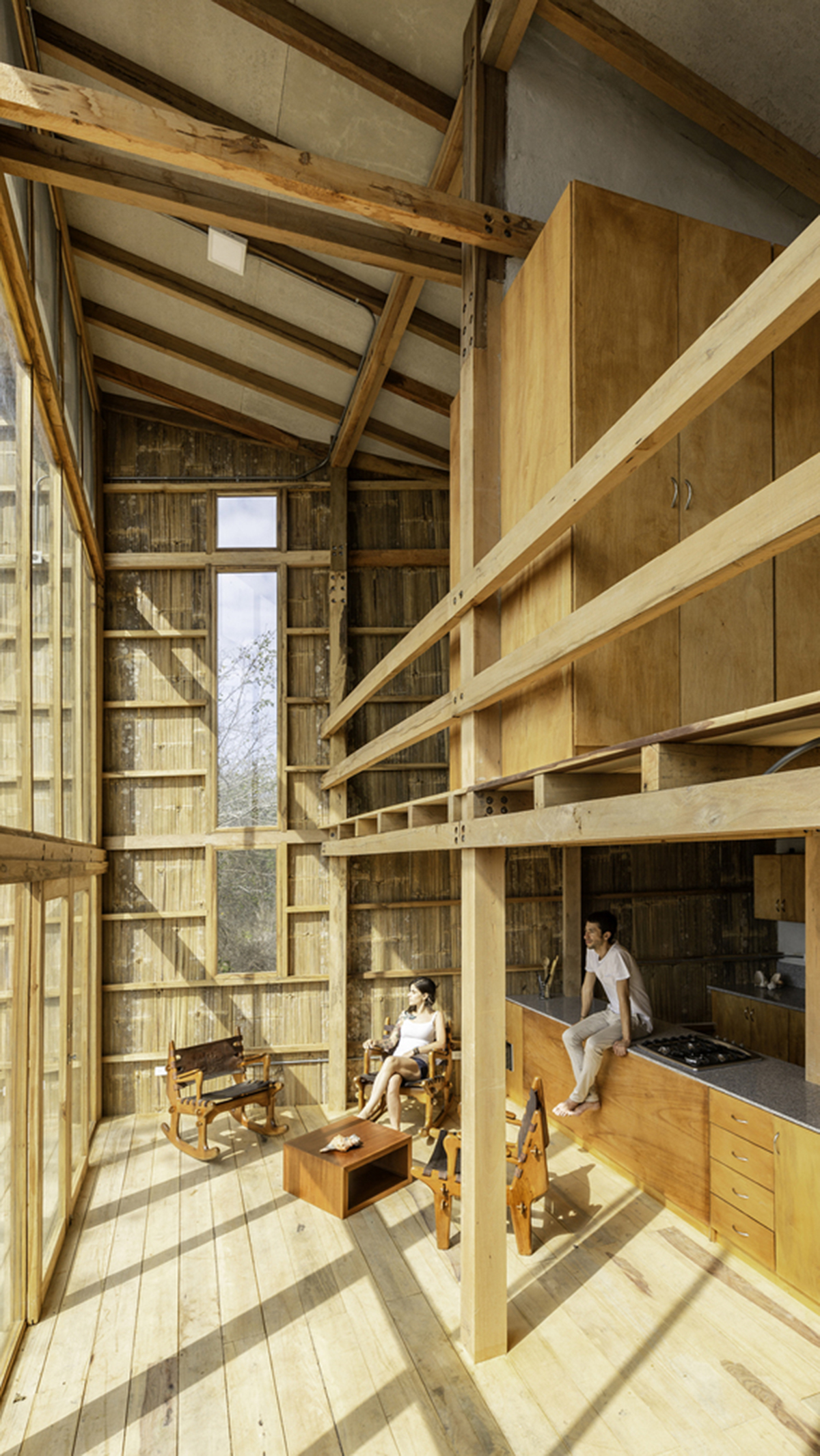 Emilio L&oacute;pez Arquitecto's Casa Don Juan features double-opening facade to look at hills of Quito