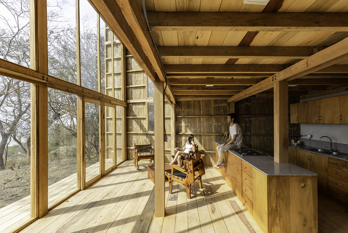 Emilio L&oacute;pez Arquitecto's Casa Don Juan features double-opening facade to look at hills of Quito