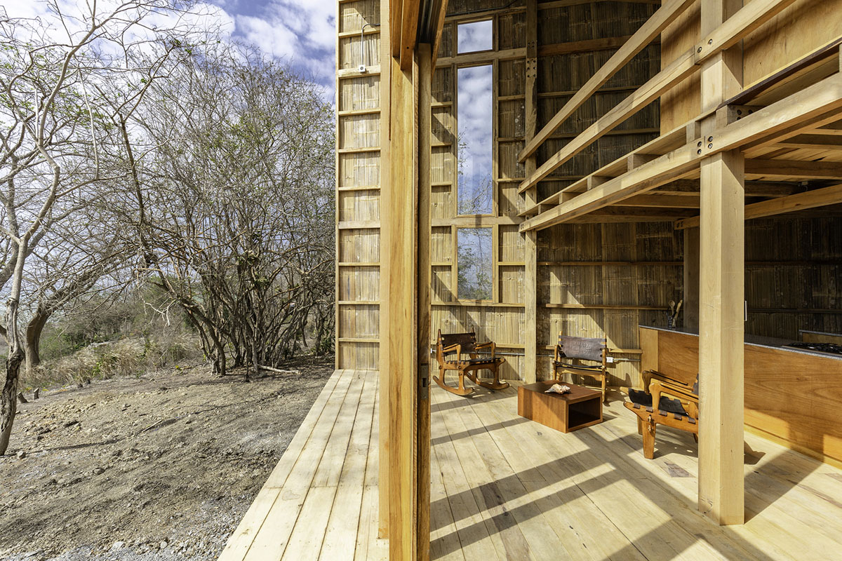 Emilio L&oacute;pez Arquitecto's Casa Don Juan features double-opening facade to look at hills of Quito