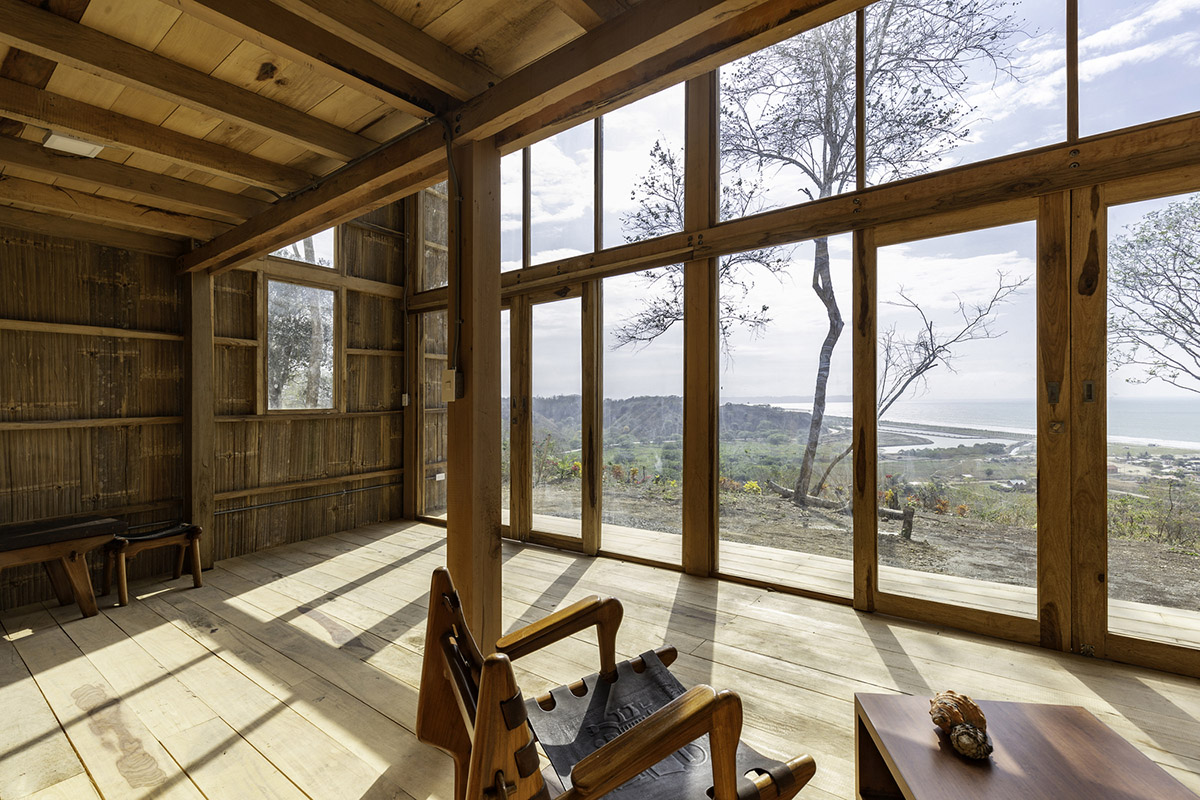 Emilio L&oacute;pez Arquitecto's Casa Don Juan features double-opening facade to look at hills of Quito