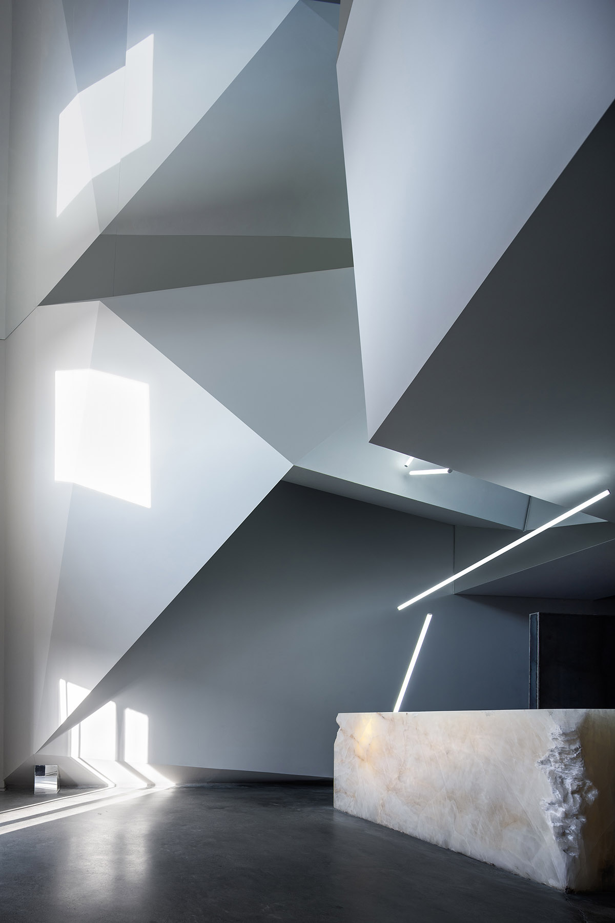 CUN converts old warehouse into a photographer's studio with industrial-looking interior in Beijing