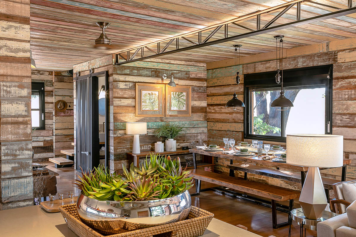 Casa Container Marília built a self-sustained container house raised on metal pillars in Brazil