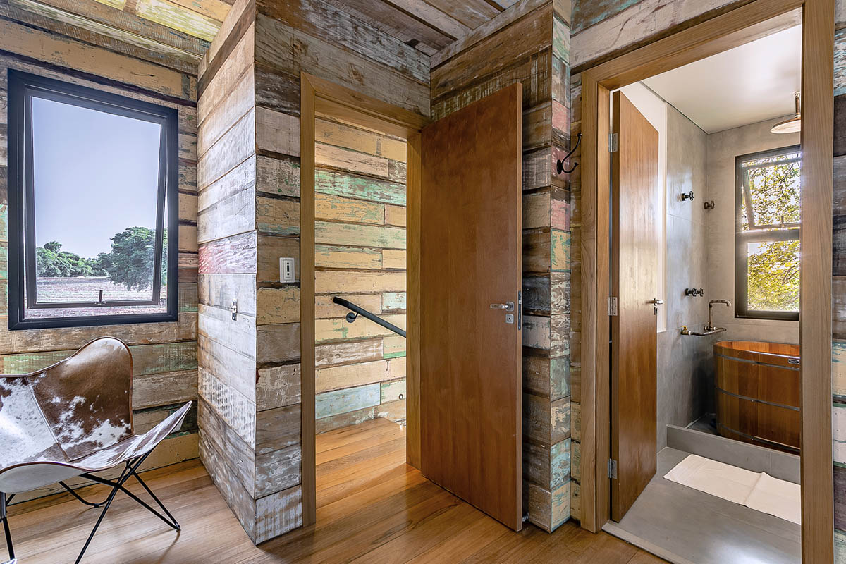 Casa Container Marília built a self-sustained container house raised on metal pillars in Brazil