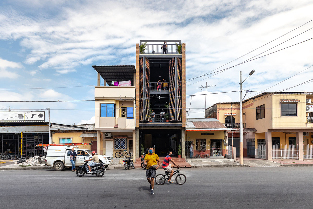 Natura Futura Arquitectura built training center featuring 8-metre-long wooden shutter in Ecuador