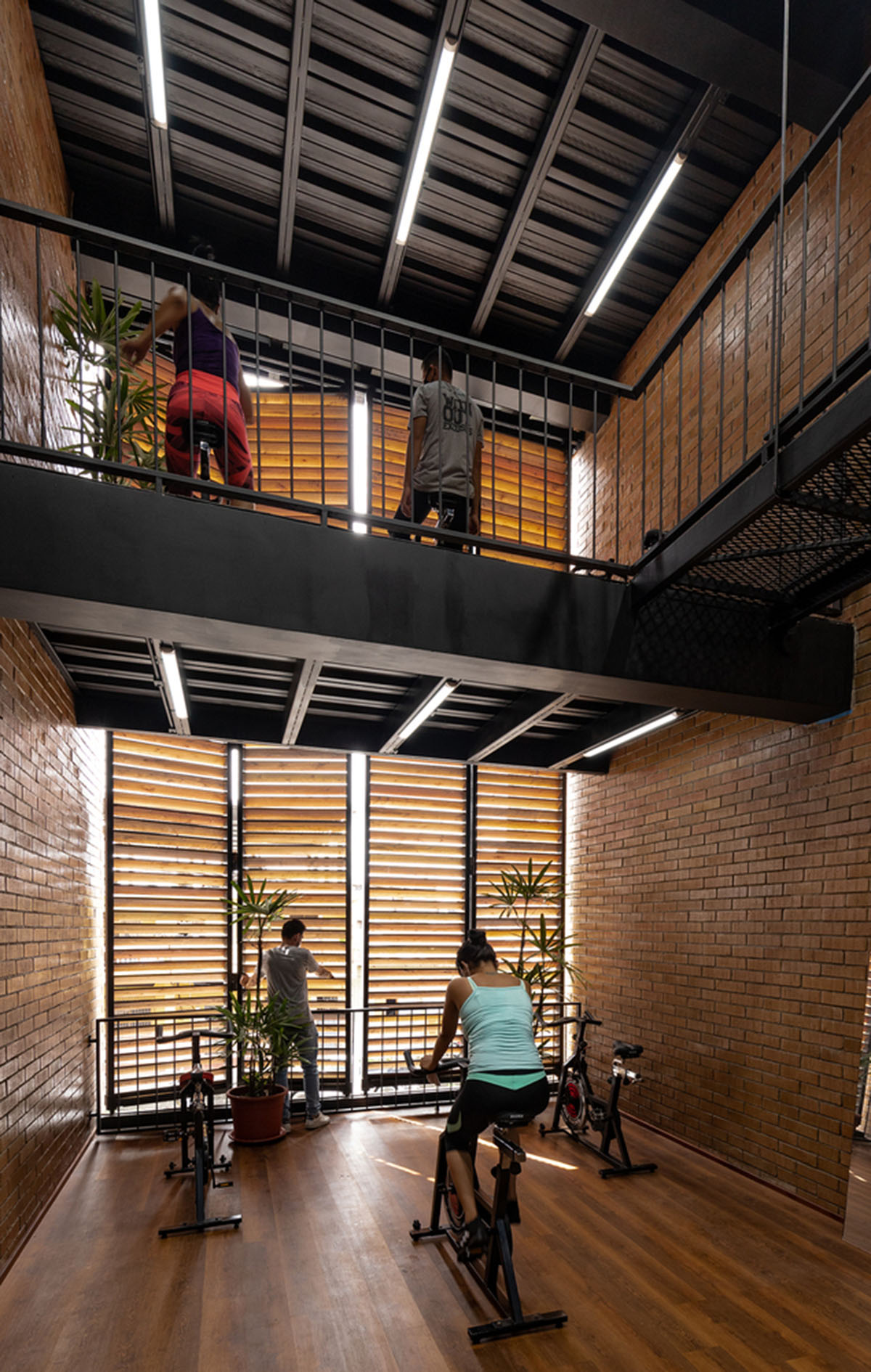 Natura Futura Arquitectura built training center featuring 8-metre-long wooden shutter in Ecuador