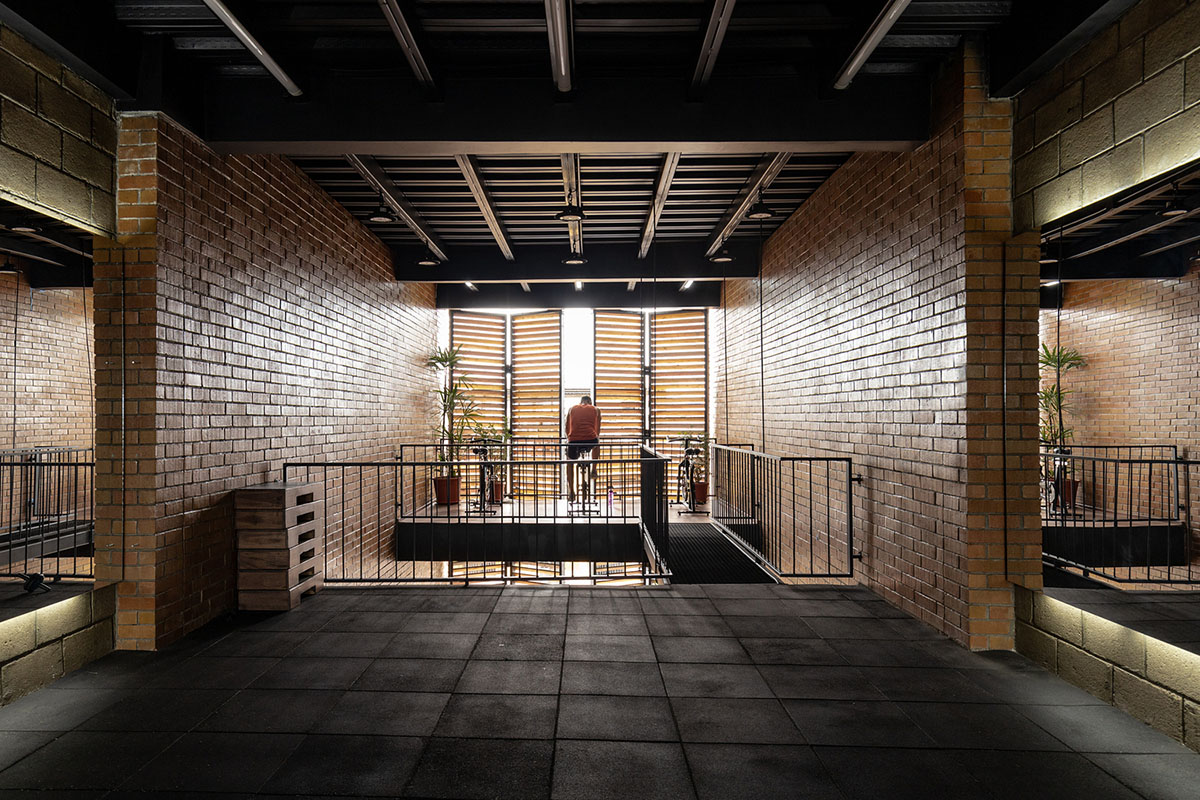 Natura Futura Arquitectura built training center featuring 8-metre-long wooden shutter in Ecuador