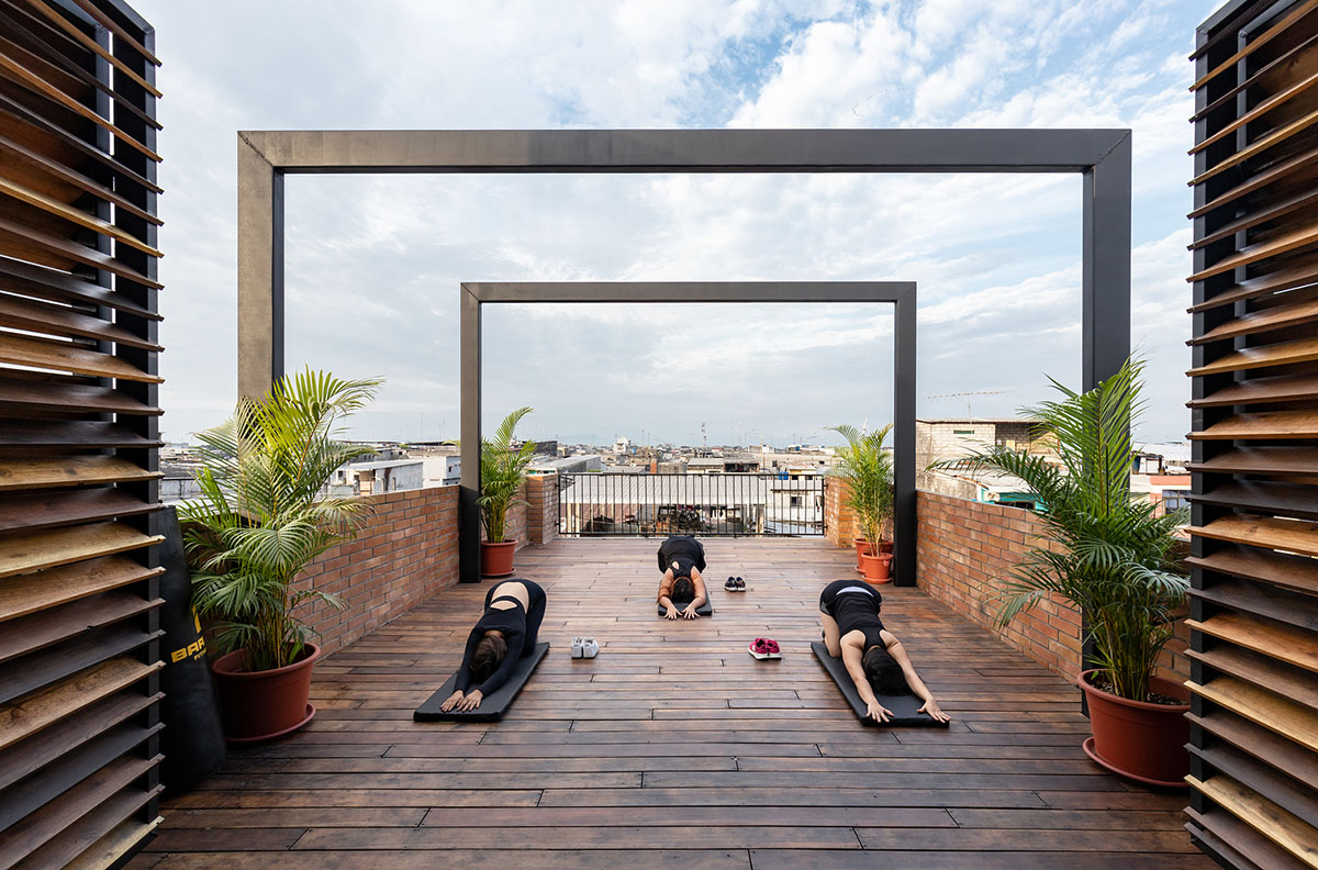 Natura Futura Arquitectura built training center featuring 8-metre-long wooden shutter in Ecuador