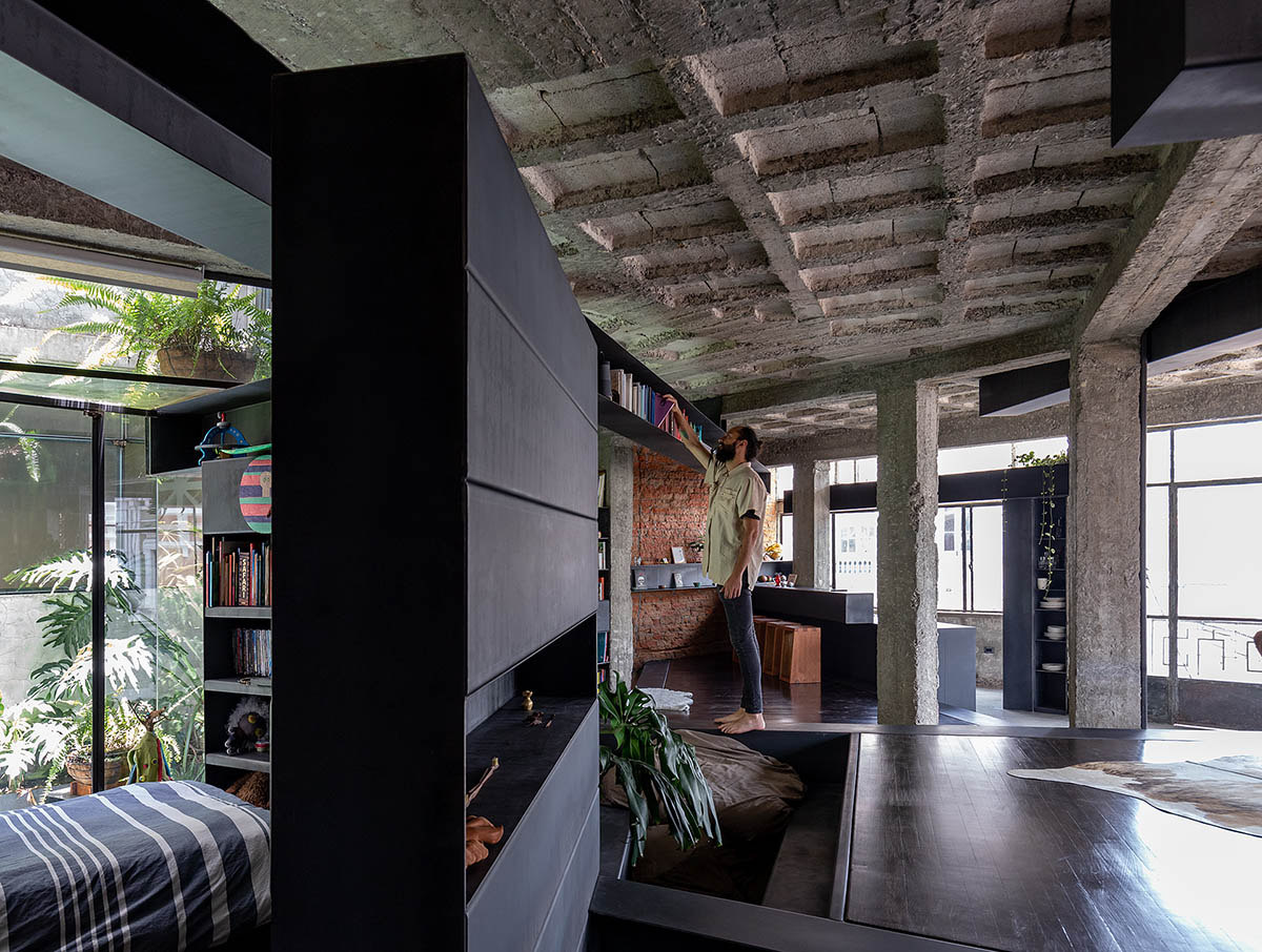 Aquiles Jarrín creates tropical interior in a Quito apartment featuring various layers of materials