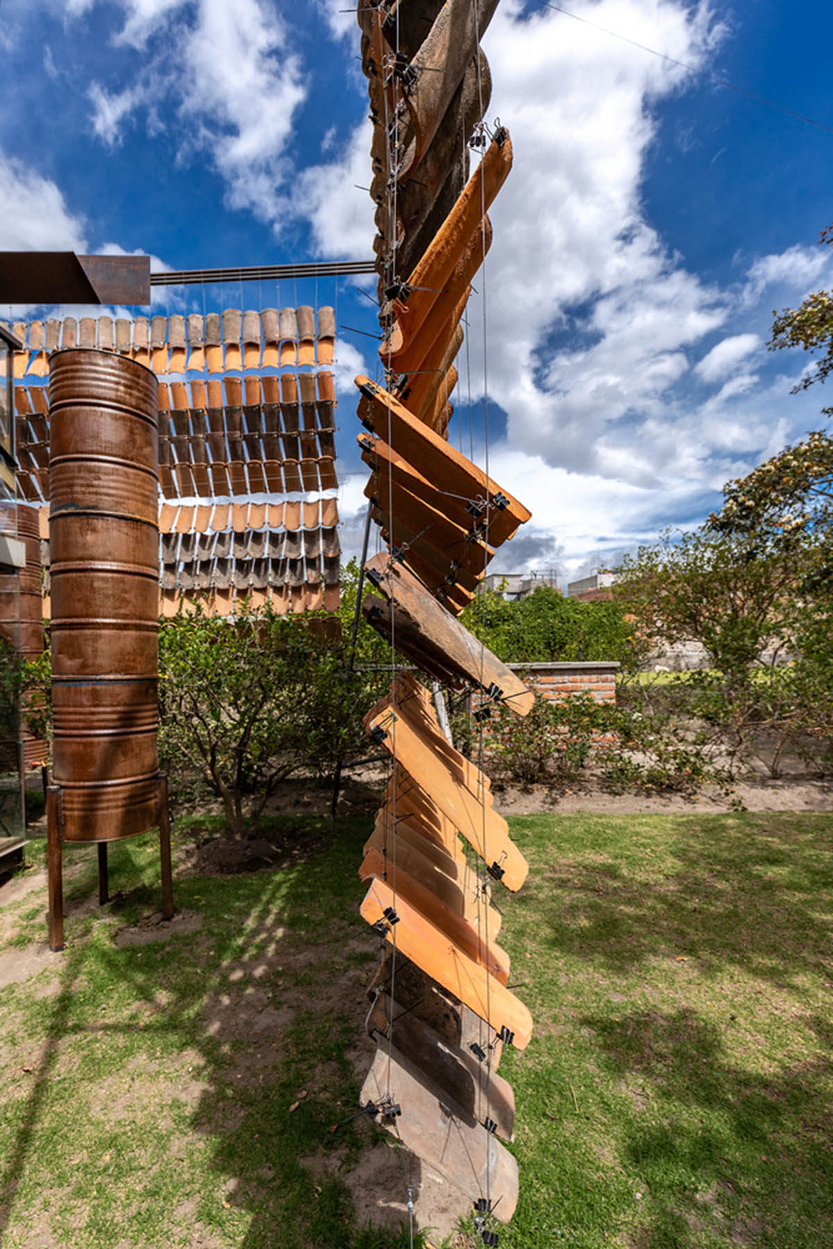 Daniel Moreno Flores creates welcoming screen with hanging tiles to mark this house in Ecuador