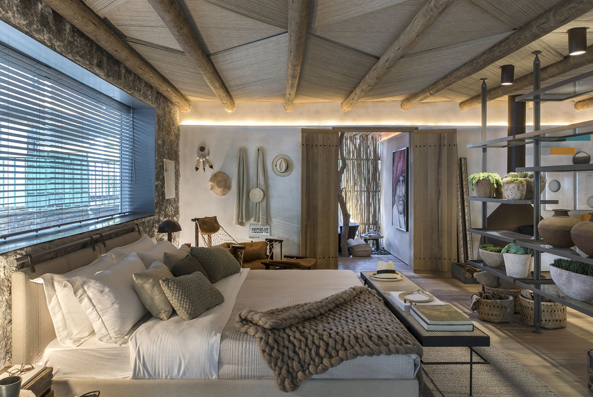 Nature-based toned material palette dominates the interior of Roots House by Triplex Arquitetura