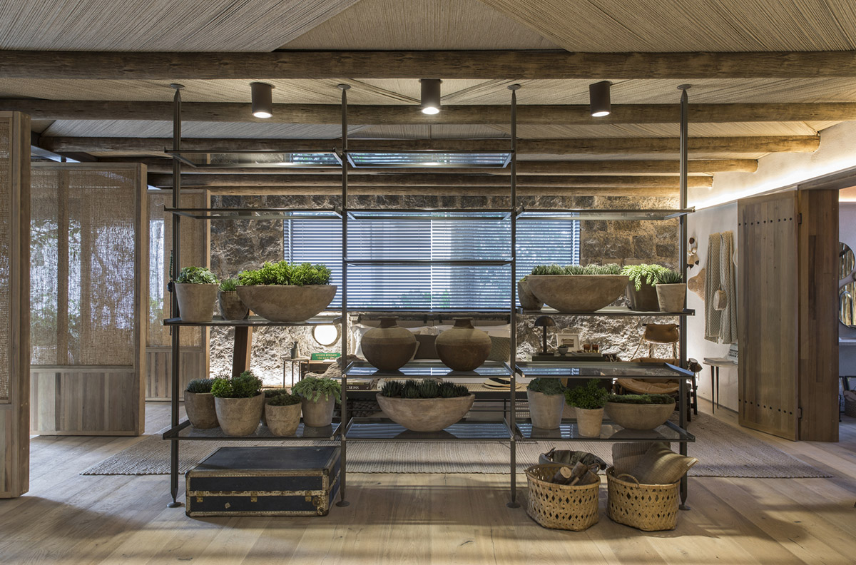 Nature-based toned material palette dominates the interior of Roots House by Triplex Arquitetura