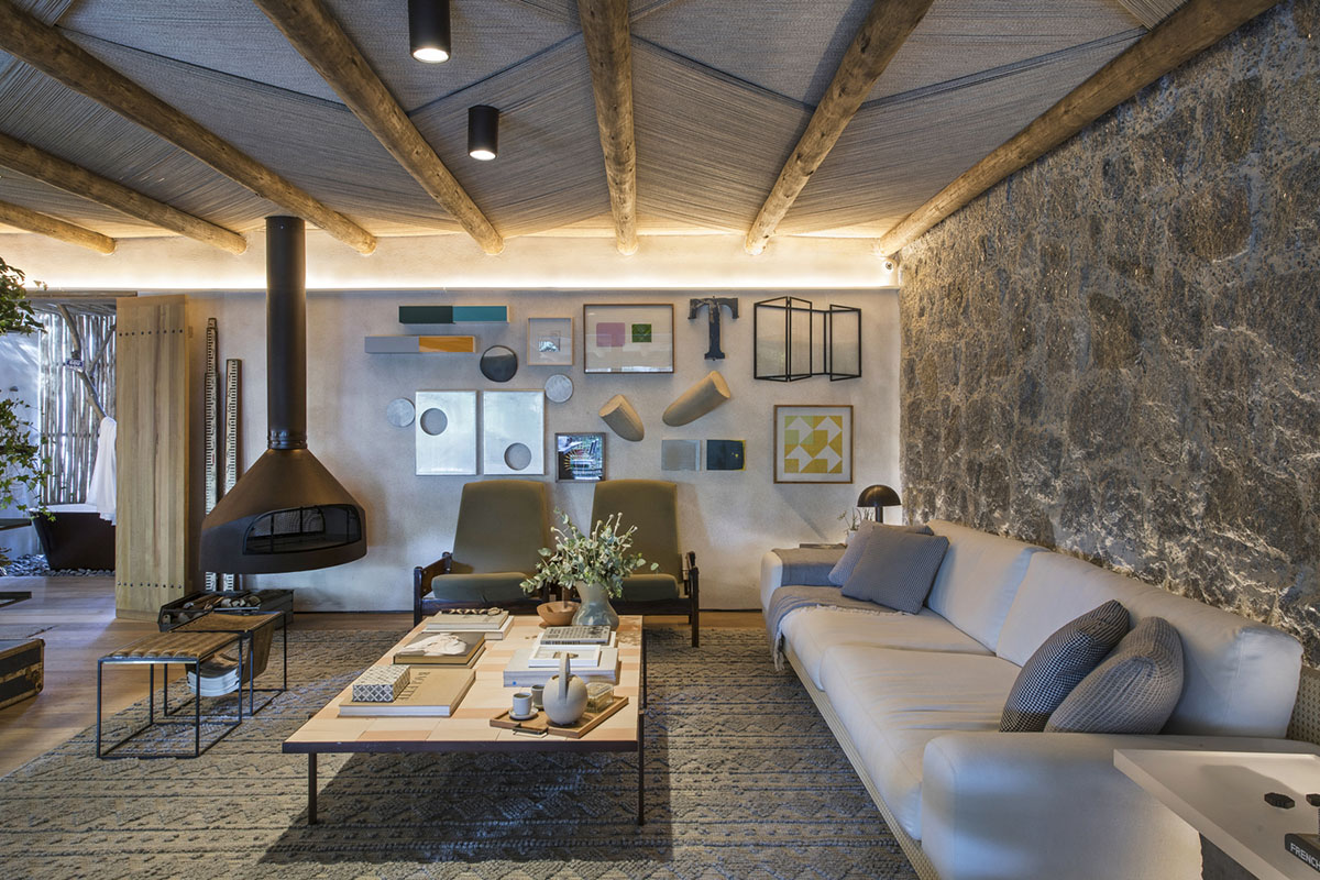 Nature-based toned material palette dominates the interior of Roots House by Triplex Arquitetura