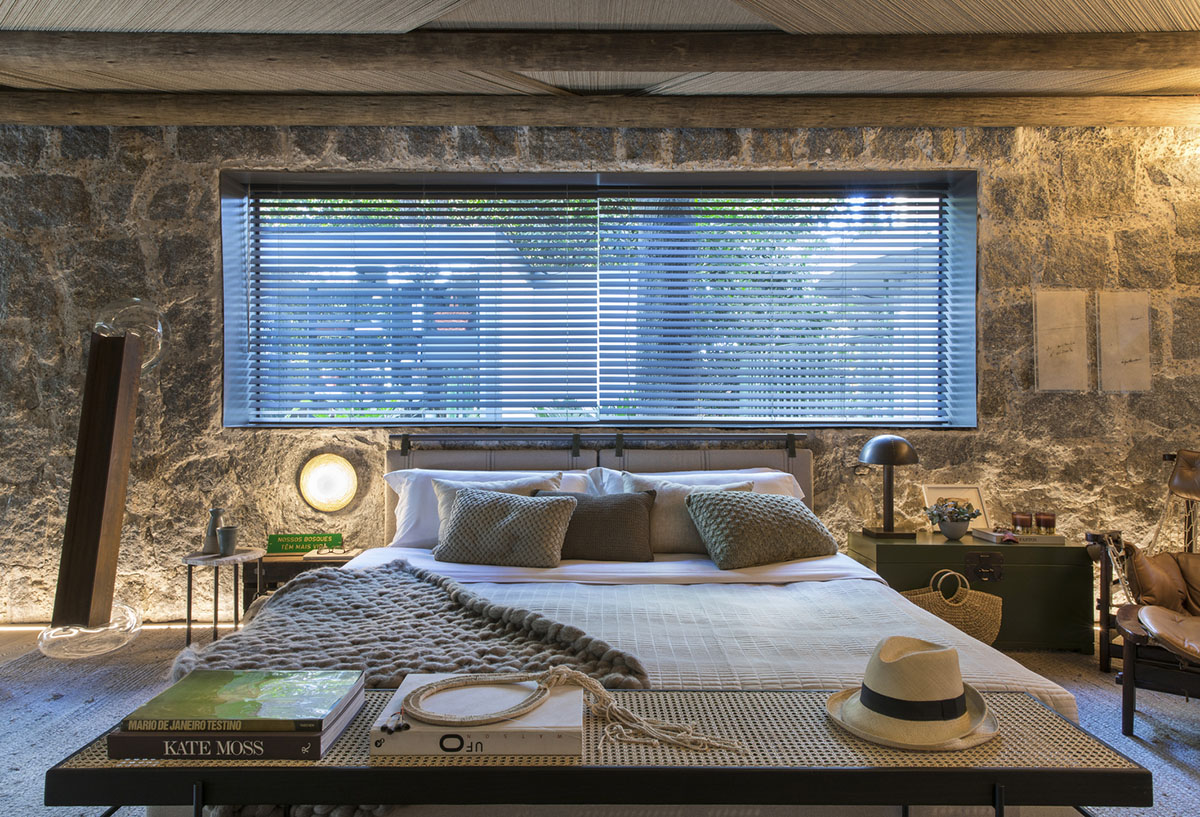 Nature-based toned material palette dominates the interior of Roots House by Triplex Arquitetura