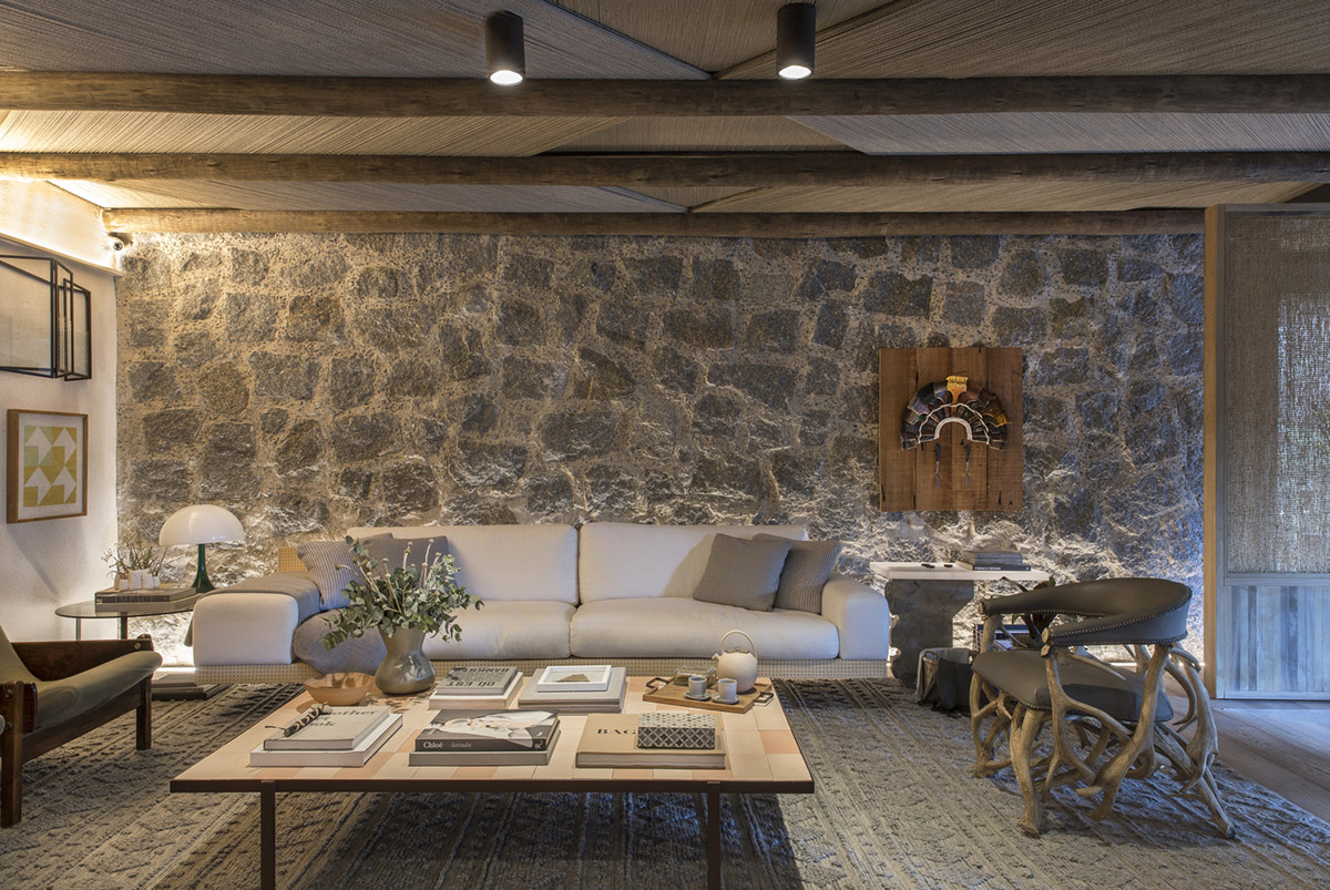 Nature-based toned material palette dominates the interior of Roots House by Triplex Arquitetura