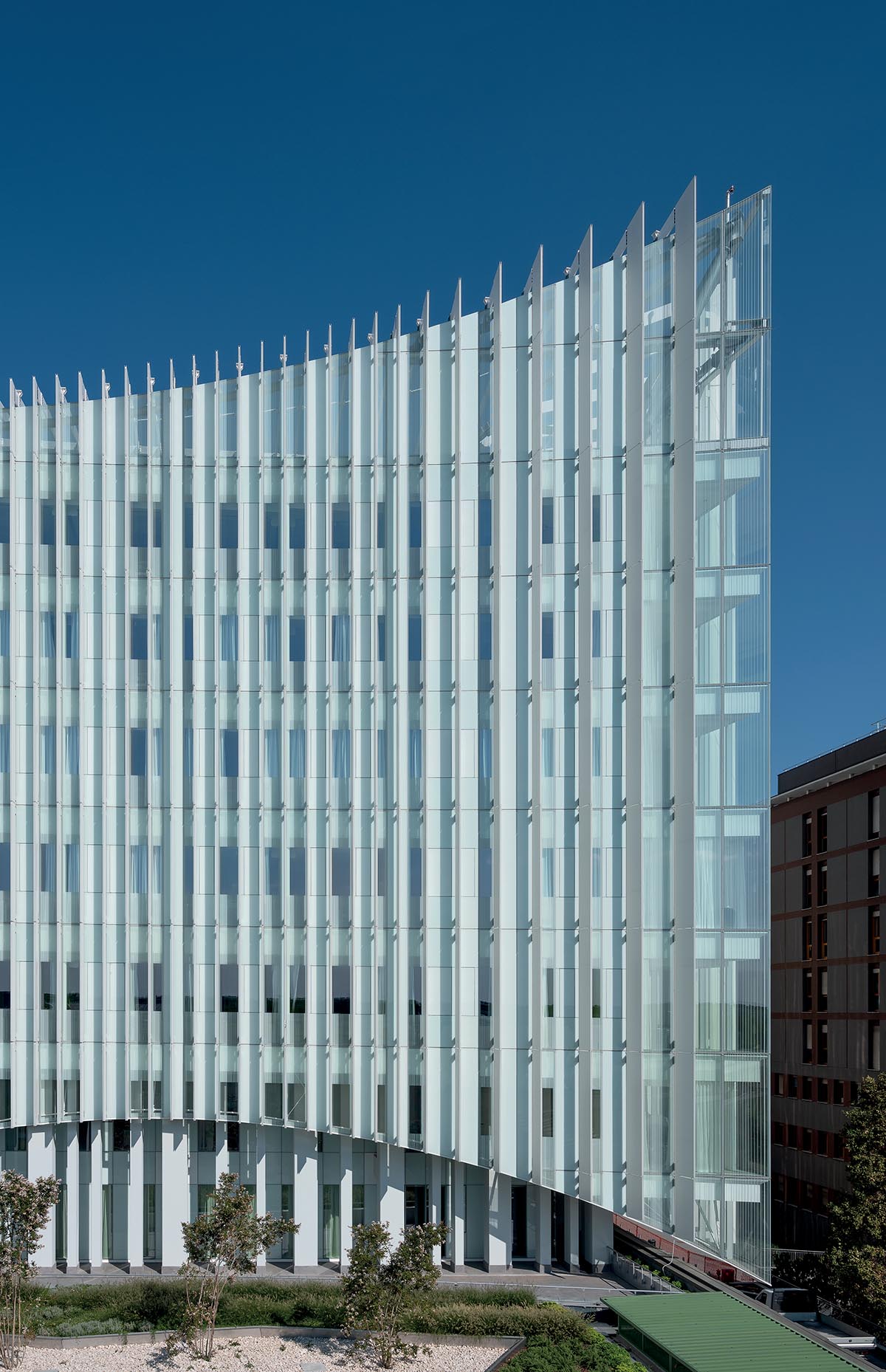 Mario Cucinella Architects wraps hospital with ceramic louvres resembling 