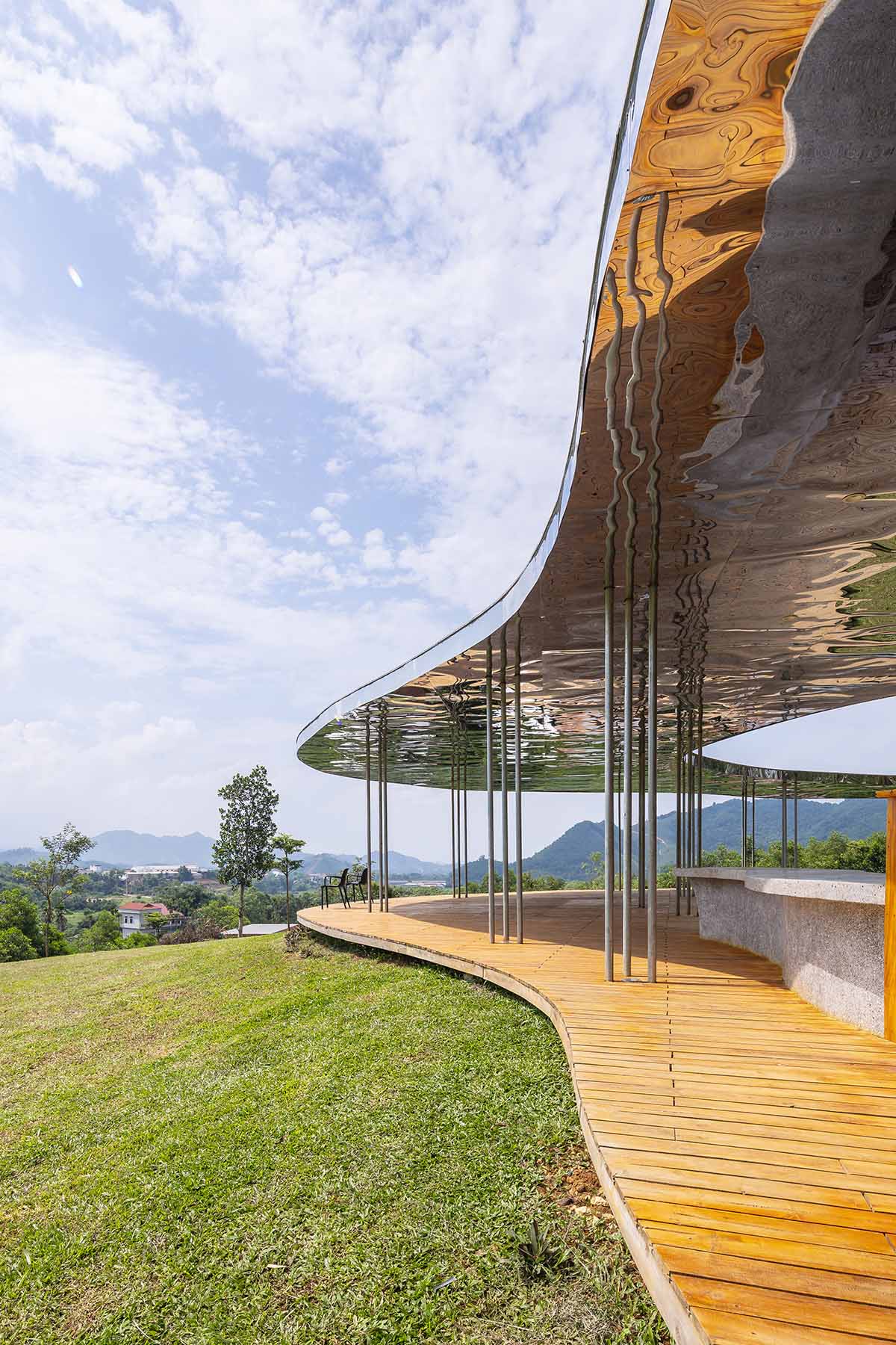 Idee architects creates sinuous and reflective canopy for Quin Pavilion on Hanoi hills