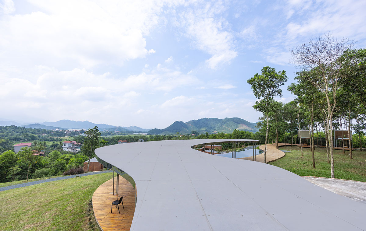 Idee architects creates sinuous and reflective canopy for Quin Pavilion on Hanoi hills