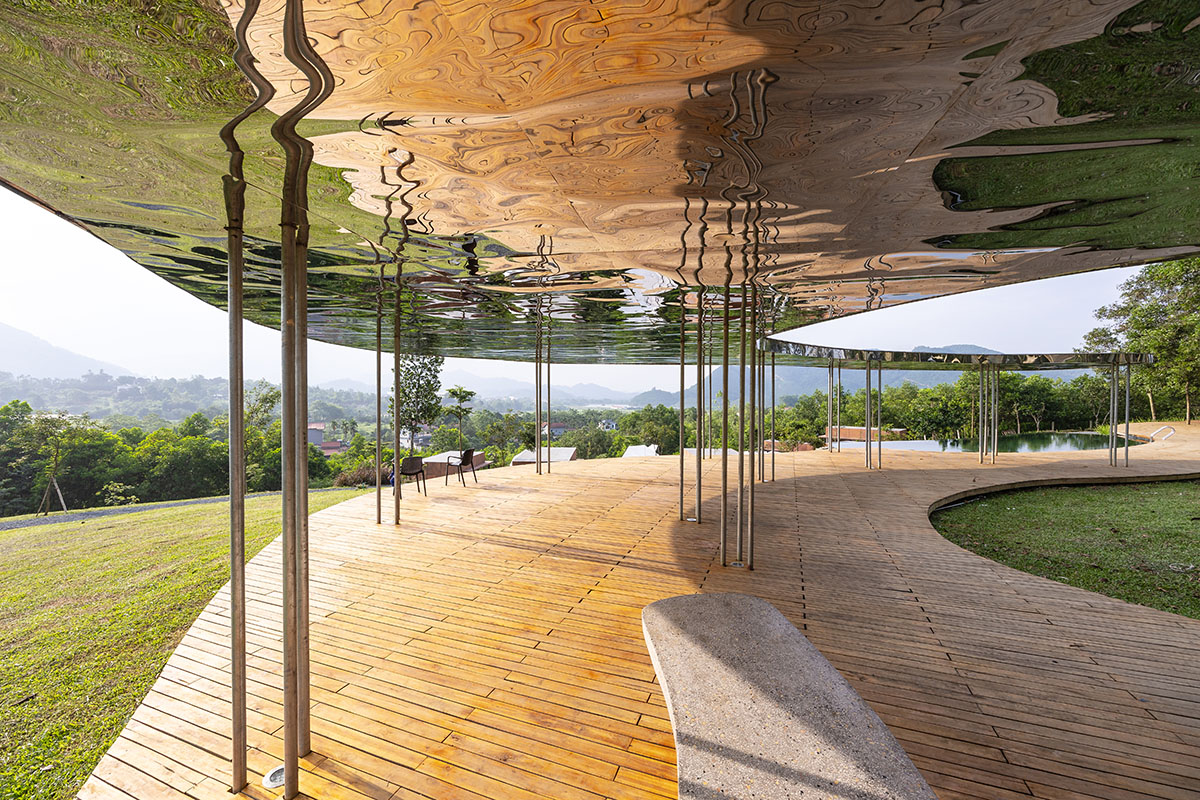 Idee architects creates sinuous and reflective canopy for Quin Pavilion on Hanoi hills