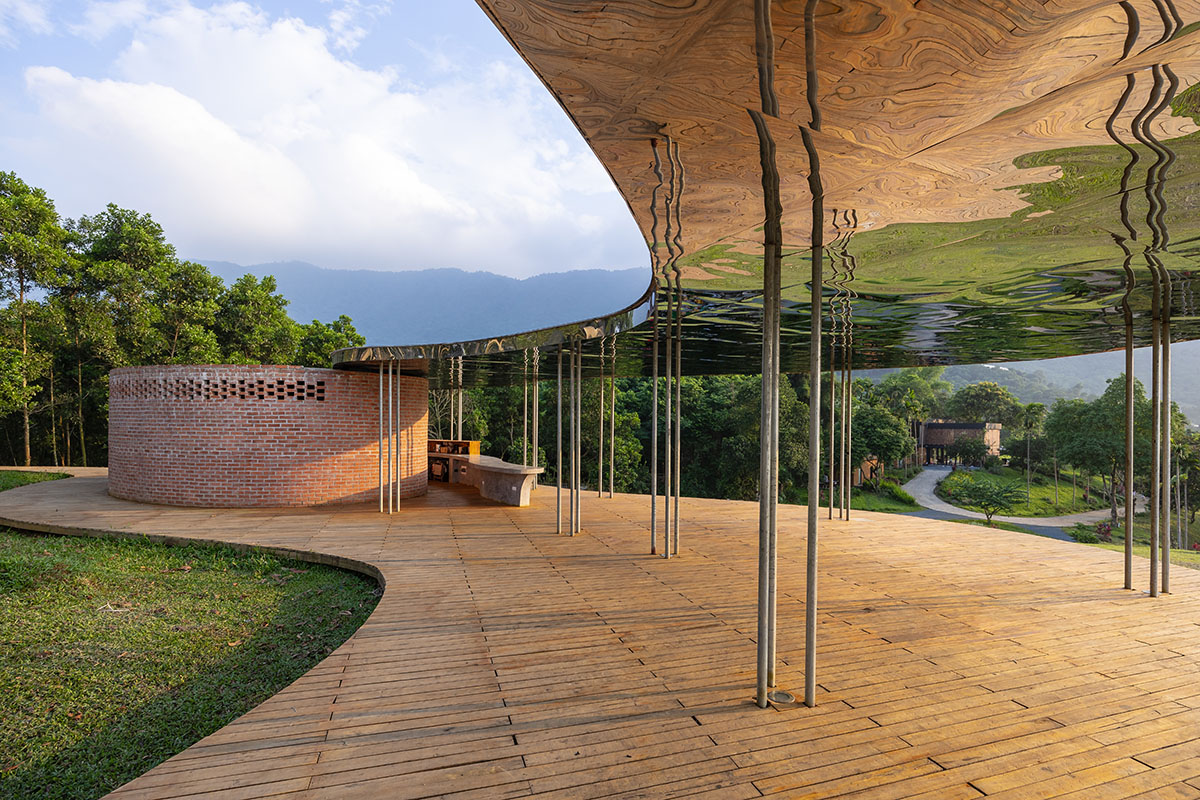 Idee architects creates sinuous and reflective canopy for Quin Pavilion on Hanoi hills