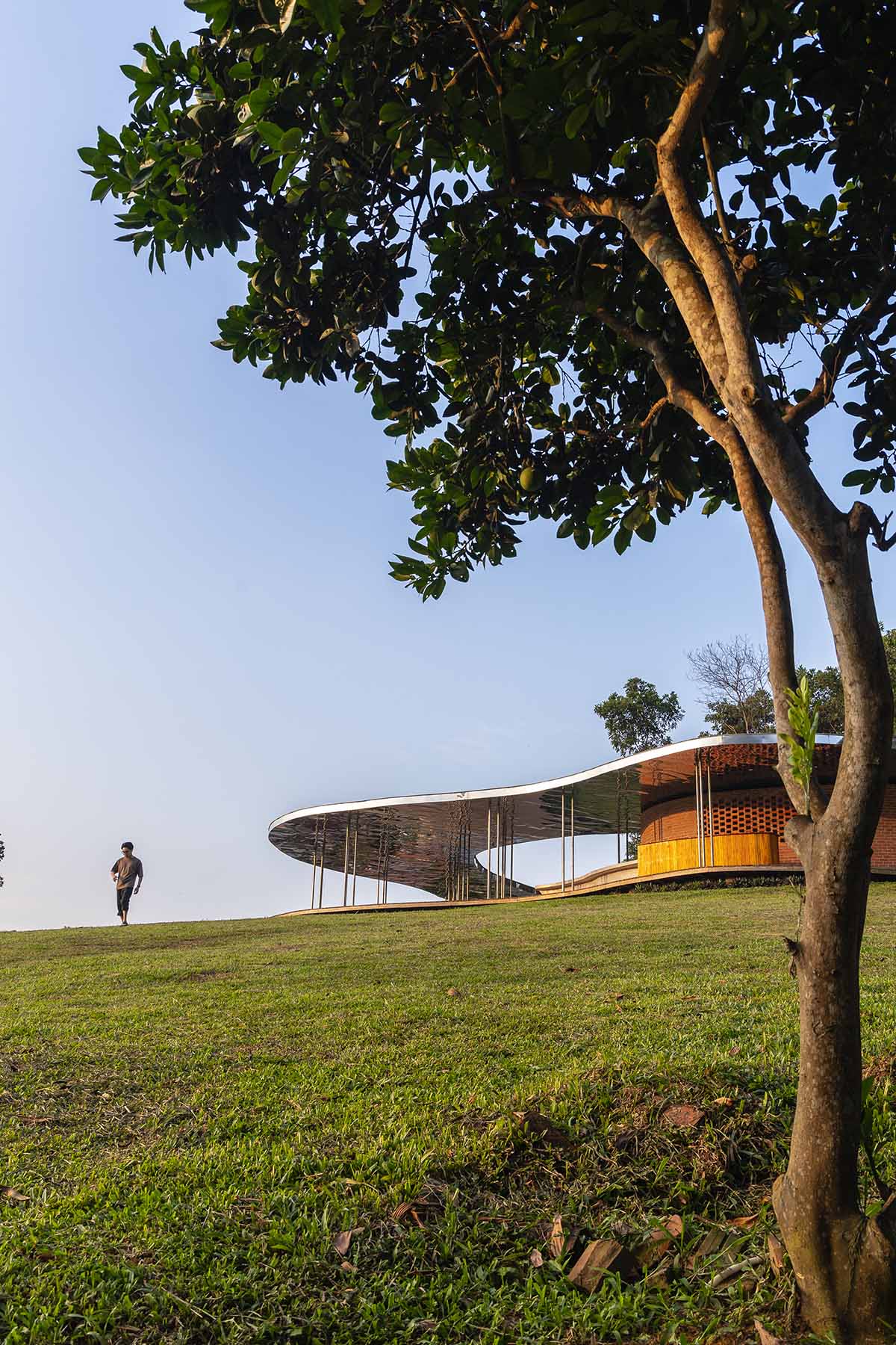 Idee architects creates sinuous and reflective canopy for Quin Pavilion on Hanoi hills