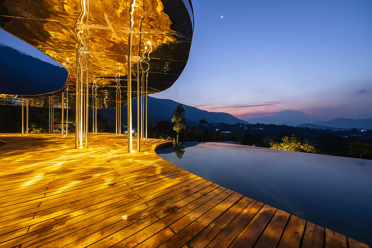 Idee architects creates sinuous and reflective canopy for Quin Pavilion on Hanoi hills