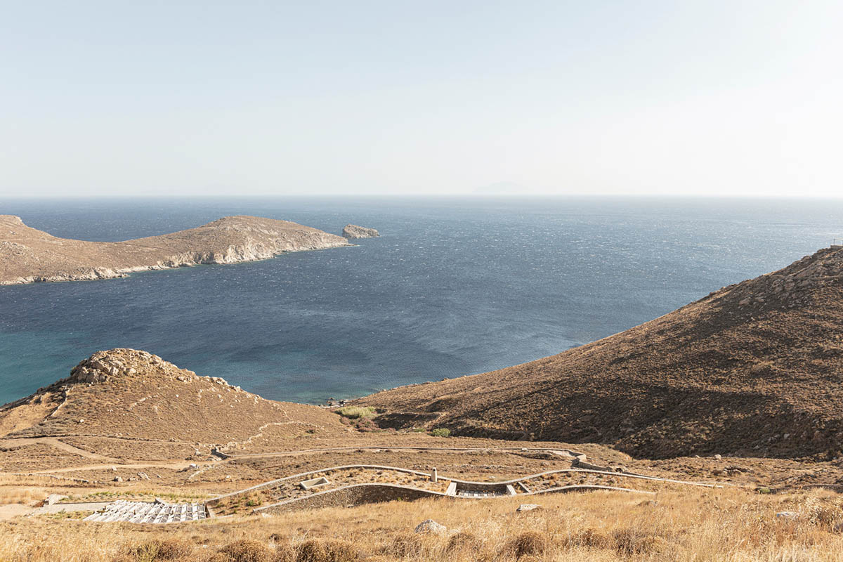 This residence by Sinas Architects designed to be entirely invisible with sinuous lines in Greece