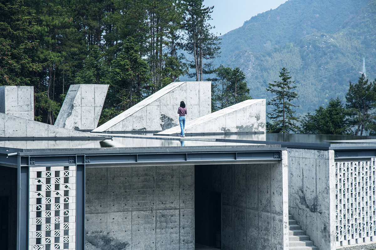 Eight diagonal light tubes are protruding from tea house to grasp prolonged sunlight hours by DnA
