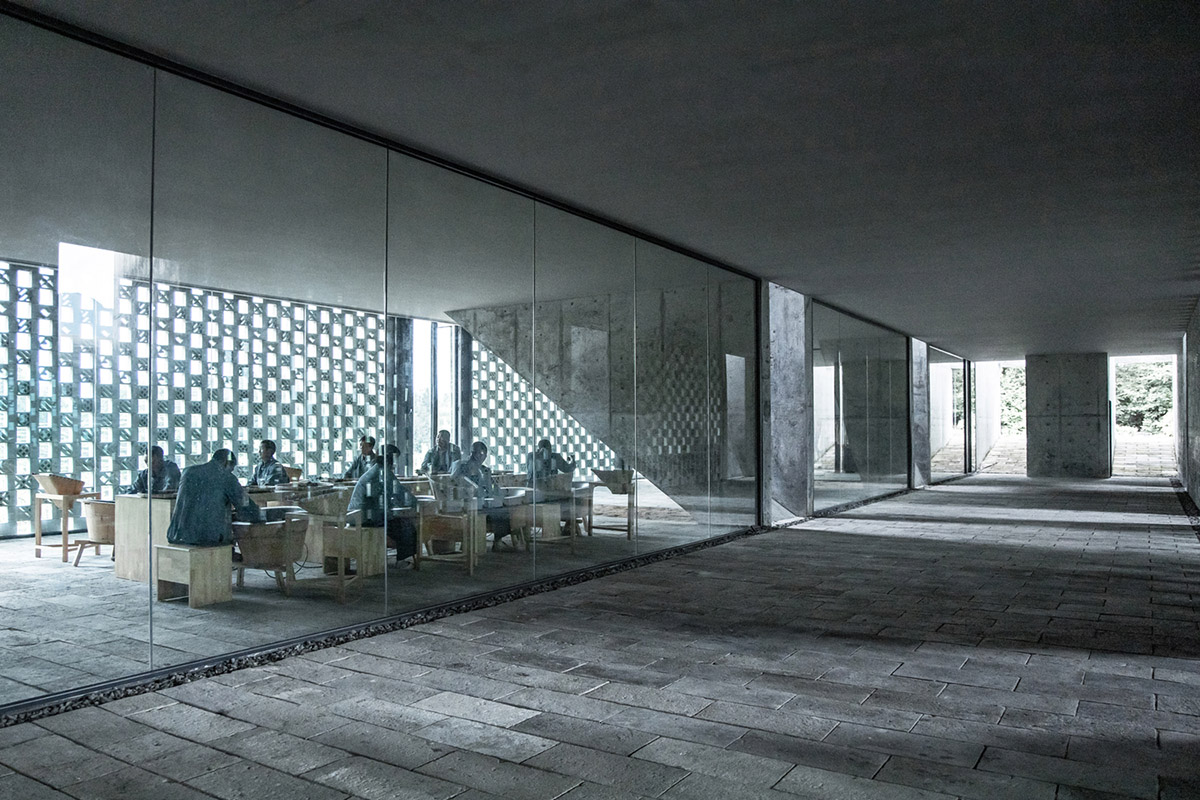 Eight diagonal light tubes are protruding from tea house to grasp prolonged sunlight hours by DnA