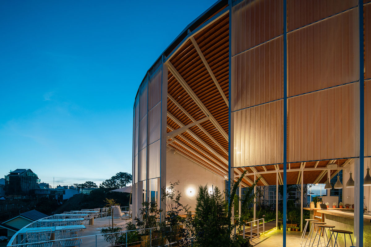 G+ Architects completes all-white circular L00P Boutique Hotel and Café in Vietnam