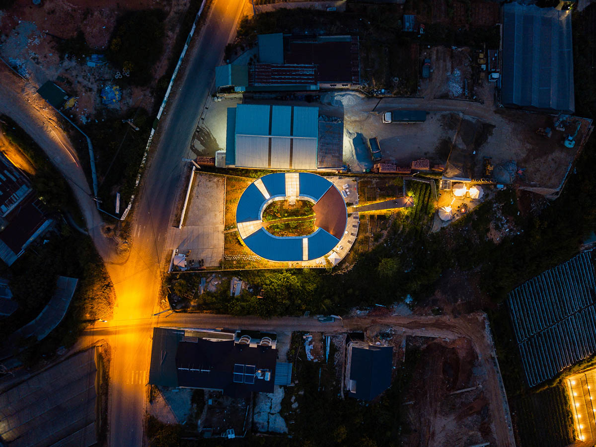 G+ Architects completes all-white circular L00P Boutique Hotel and Café in Vietnam