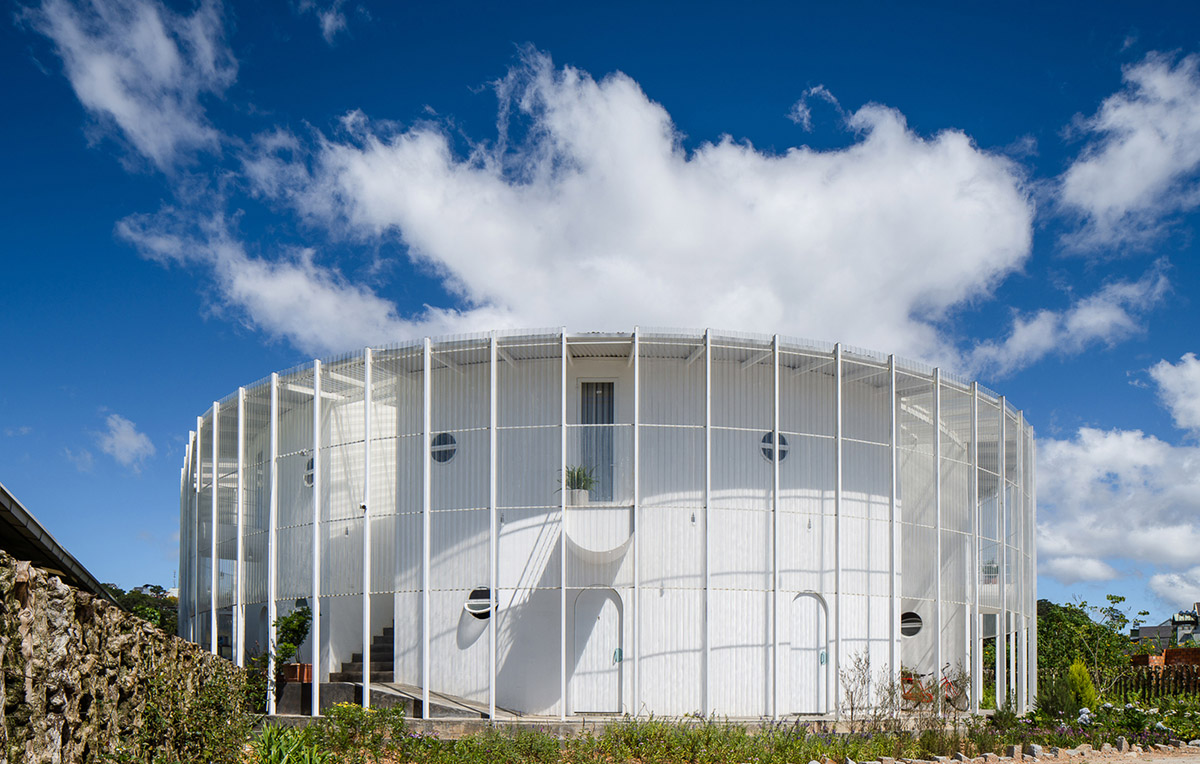 G+ Architects completes all-white circular L00P Boutique Hotel and Café in Vietnam