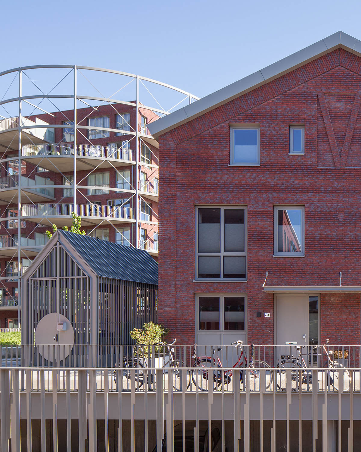 Mecanoo completes Villa Industria with red-brown bricks in a former gasworks site of Hilversum