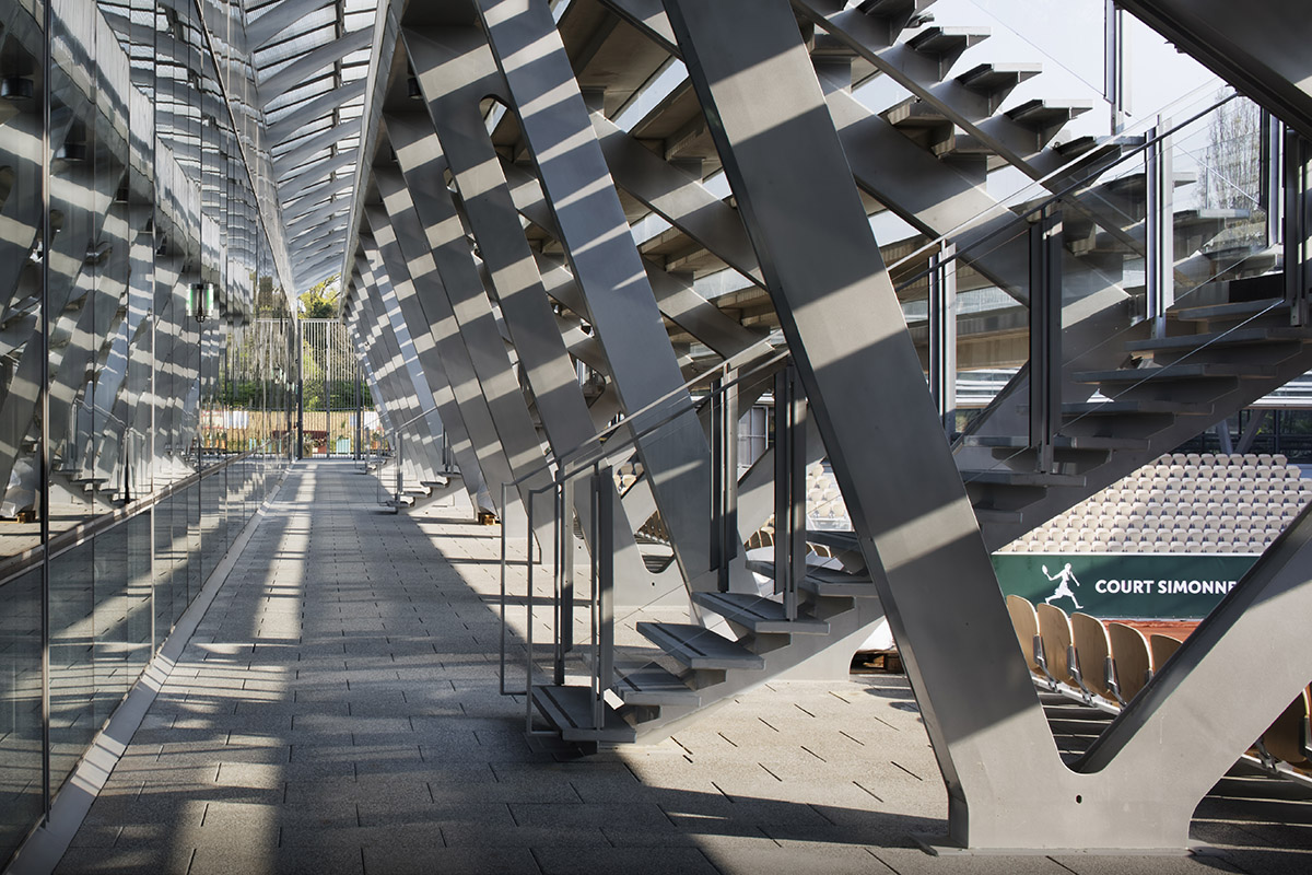 Marc Mimram built greenhouses in all sides of a tennis stadium to attract different audiences