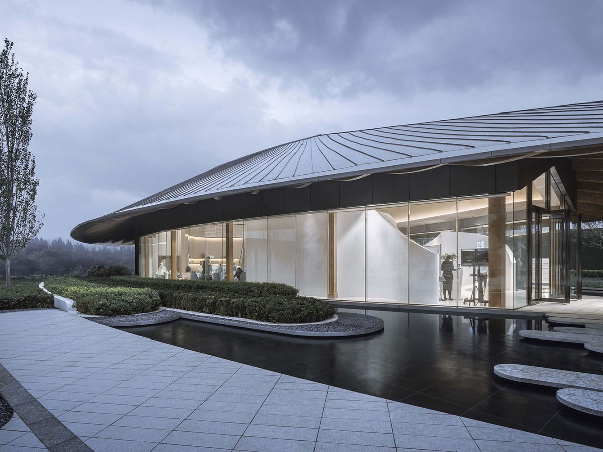 Ruf Architects' exhibition gallery features water drop-shaped roof overlooking the Yongding River