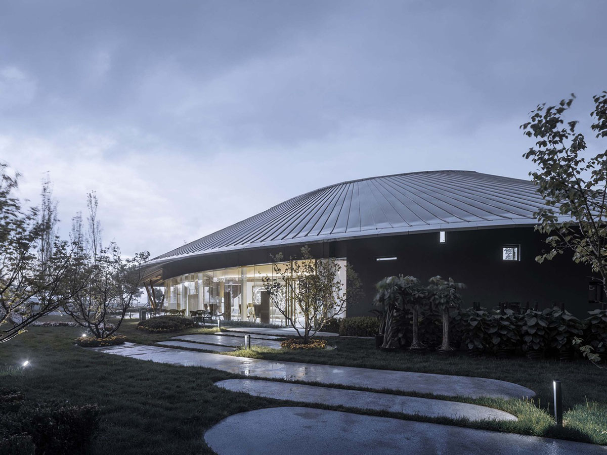 Ruf Architects' exhibition gallery features water drop-shaped roof overlooking the Yongding River