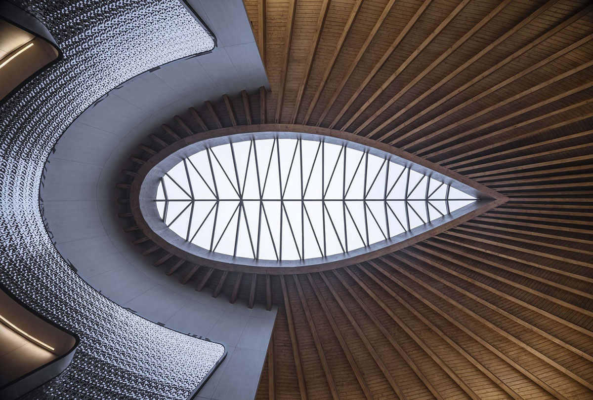 Ruf Architects' exhibition gallery features water drop-shaped roof overlooking the Yongding River