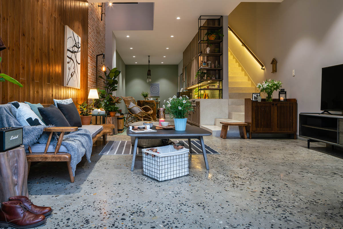 Artistic brick doorways and skylights give more depth to this Vietnamese house designed by Coi Design