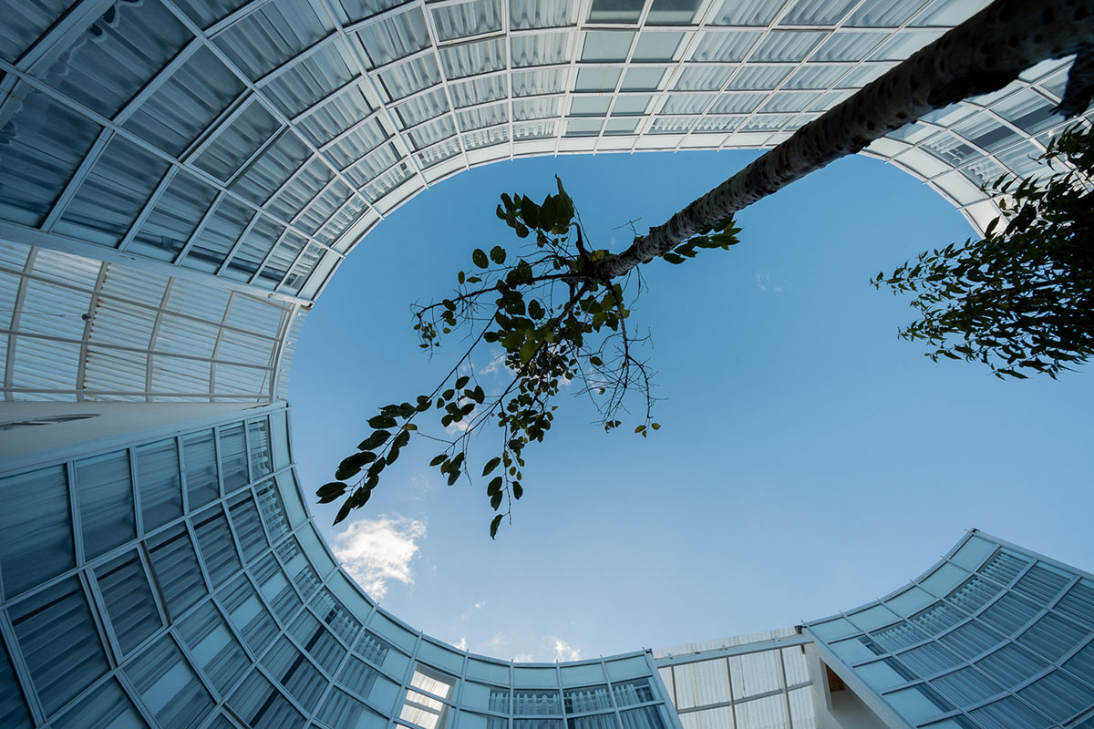 G+ Architects completes all-white circular L00P Boutique Hotel and Café in Vietnam